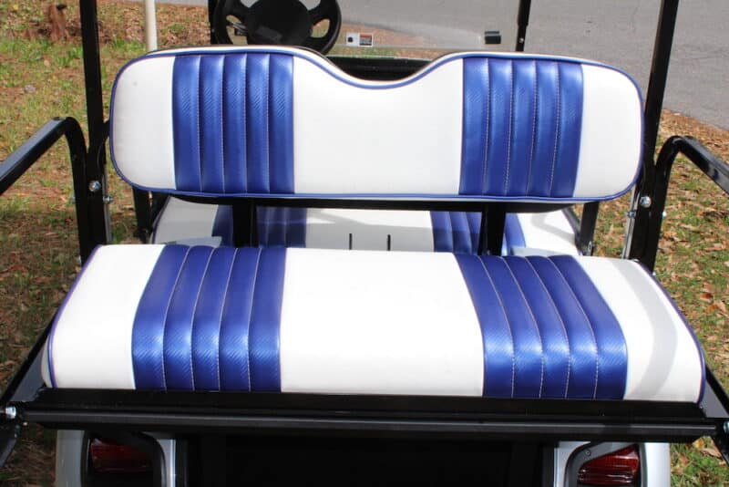 White and blue golf cart seats on 4-seater golf cart
