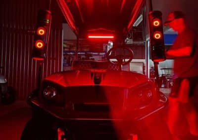Golf cart with rad red lighting all over