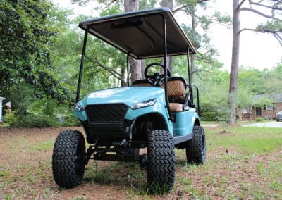 Custom teal lifted cart with faux leather seats