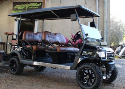 Custom black 6-seater cart with faux leather seats