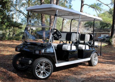 Custom black 6-seater golf cart and white and black seats