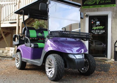 The truly rad ride! A purple golf cart with extra storage and custom upholstery to show the Rad Rydz logo